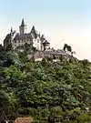 Image 17Coloured black and white photograph: the Burgberg with Wernigerode Castle (between 1890 and 1905) (from List of mountains and hills of the Harz)