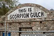 Scorpion Gulch sign taken during construction.