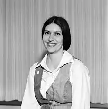 Megan Cornish poses in front of a wall