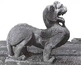 A Chinese Pixiu, (Chinese: 貔貅; pinyin: píxiū; Wade–Giles: P'i-hsiu) head of a Chinese dragon, body of a lion and with a pair of feathered wings, at the tomb of Emperor Wu of Southern Qi (Xiao Ze) in Danyang (near Nanjing, China).
