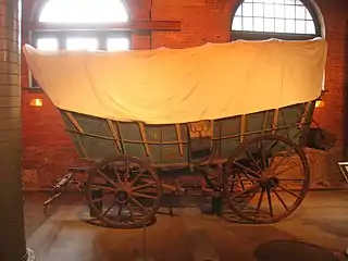 A Conestoga wagon, a type of freight wagon used extensively in the United States and Canada in the 18th and 19th centuries for long-distance hauling