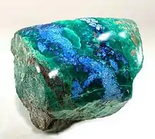 Polished shattuckite with malachite, New Cornelia mine, Ajo, Arizona. Size 5.3×5.1×5.0&nbsp;cm