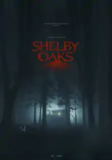 In the middle of a dark forest lies a cabin with a fox nearby