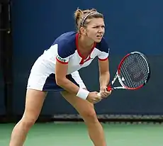 Halep in ready stance to return serve