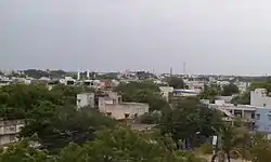 Image of the town with mosque amidst a housing locality