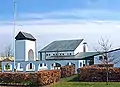 The modern church of Skelager Kirke.