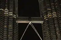 A skybridge connects the two towers