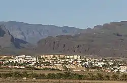 view of Sonnenland showing a cluster of holiday apartments with mountains in the distance