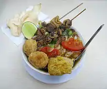 Soto with tripes and cockles satays