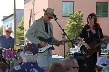 Southern Culture on the Skids perform in Raleigh, NC, 17 April 2010. Left to right: Dave Hartman, Rick Miller, and Mary Huff.