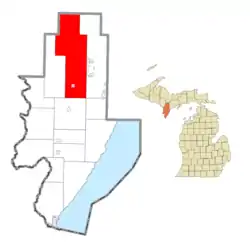 Location within Menominee County (red) and the administered village of Powers (pink)