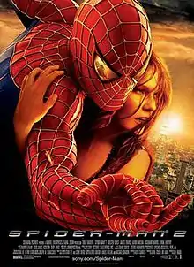 Against a New York City background, Spider-Man hugs Mary Jane Watson, with a reflection of Doctor Octopus in his eye as he shoots a web.