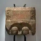 Funerary stele of a couple, with epigraphic cartridge held by two Cupids. Middle of the 3rd century. Found in Dachstein