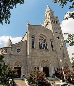 Photograph from the street looking up at St. Peter's Church