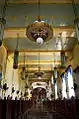 Interior of St Francis of Assisi Church, Sariaya, Quezon showing the altar and ceiling lamps