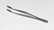 Stamp tongs with rounded tips help to prevent damage to stamps from skin oils and rough handling