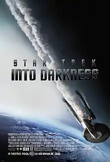 The poster shows the USS Enterprise falling toward Earth with smoke coming out of it. The middle of the poster shows the title written in dark gray letters, and the film's credits and the release date are shown at the bottom of the poster.