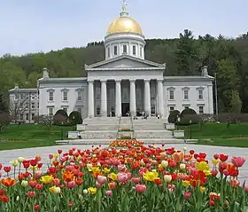 Image 25The gold leaf dome of the Vermont State House in Montpelier is visible for many miles around the city. This is the third State House on the site, and like the second, was built in the Greek Revival architectural style. It was completed in 1857. Montpelier became the state capital in 1805. (from History of Vermont)