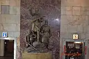 A statue dedicated to the partisans of the Great Patriotic War is near the entrance to the station.