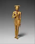 Ancient Egyptian statuette of Amun; 945–715&nbsp;BC; gold; 175&nbsp;mm ×&nbsp;47&nbsp;mm (6.9&nbsp;in ×&nbsp;1.9&nbsp;in); Metropolitan Museum of Art