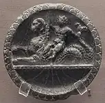 A stone plate (1st century).