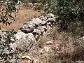 Reused stones that form a wall at Chezib (Achziv) of Judah