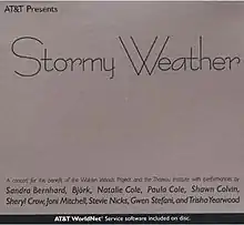 A white paper insert displaying the album's title and artists in similar fonts.