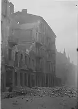 NARA copy #45no image caption, in section This is how the former Ghetto looks after having been destroyedNowolipie 56 in the center.