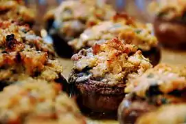 Close-up view of cooked stuffed mushrooms