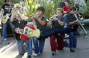 Suburban Legends in 2002.(Left to right: Brian Klemm, Brian Robertson, Vince Walker, Aaron Bertram, Derek Rock, Dallas Cook. Across: Tim Maurer. Not pictured: Chris Maurer.)