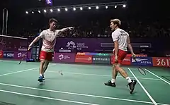 Marcus Fernaldi Gideon and Kevin Sanjaya Sukamuljo celebration at the 2018 Asian Games men's team semifinals