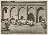 1922 photo showing the sultan in the Inner Mechouar, returning from prayers at the Great Mosque of Fes el-Jdid which was directly connected to the palace