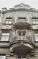 The art nouveau sunflower building designed 1901–1905 by A. Walczok at 2, Mickiewicz Street in Bielsko. Before World War II it was owned by Leo Kohany, perhaps a distant relative of Miriam Kohany's family, photo by Ewa Kuryluk, 2003.