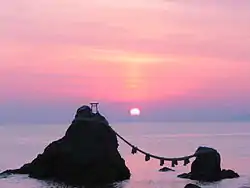 The pair of Meoto Iwa rocks off the coast of Ise city, Mie prefecture during sunset