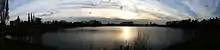 A panoramic photography picture showing Sandhill Lake at sunset on 20 April 2014.