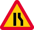 Road narrows on right sides