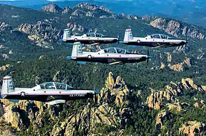 A four-ship formation of T-6A Texan II based at Vance AFB.