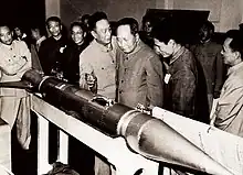 Mao Zedong inspecting a T-7M rocket after its successful launch.