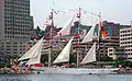With the crew in the yardarms, Taragini slips along the Halifax, Nova Scotia, Canada waterfront in 2007.