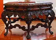 Carved wooden table from unknown century at the Franz Mayer Museum in Mexico City