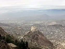 A photo shows Al-Qahirah District