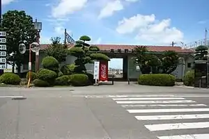 Crossing and station entrance in 2009
