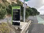 Michael Joseph Savage Memorial sign at the public entrance to Takaparawhau from Tamaki Drive, 2022.
