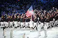 Team USA marches in the parade of athletes around BC Place stadium during the opening Ceremony of the XXI Olympic Winter Games, February 12, 2010, in Vancouver – The standard-bearer is Mark Grimmette.