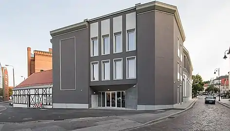 Renovated building viewed from the Brda river