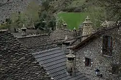 Traditional rooftops and chimneys in the Village of Borau.