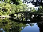 Rustic bridge at Tensha-en garden in Uwajima (1866)