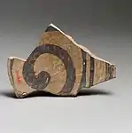 Terracotta rim fragment with latticework design; 3800-3300 BC; terracotta; length: 10.6 cm (4.mw-parser-output .frac{white-space:nowrap}.mw-parser-output .frac .num,.mw-parser-output .frac .den{font-size:80%;line-height:0;vertical-align:super}.mw-parser-output .frac .den{vertical-align:sub}.mw-parser-output .sr-only{border:0;clip:rect(0,0,0,0);clip-path:polygon(0px 0px,0px 0px,0px 0px);height:1px;margin:-1px;overflow:hidden;padding:0;position:absolute;width:1px}3⁄16 in.); Metropolitan Museum of Art