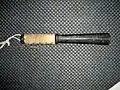 Small Japanese Tetsubo, an iron club with a leather grip.