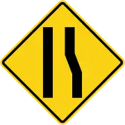 Road narrows on right side